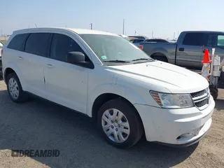 2015 Dodge Journey American Value Pkg with VIN 3C4PDCAB1FT641657, listed as a IAAI auction lot 41800582 with 211,257 mi miles. Bid and sale history available at carsss.com. Image 1.