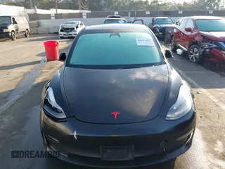 2022 Tesla Model 3 Performance z VIN 5YJ3E1EC7NF137744, wystawiony jako IAAI lot #41427701 z przebiegiem Nie podano mil oraz . Historia ofert i sprzedaży dostępna na DreamBid. Obrazek 11.