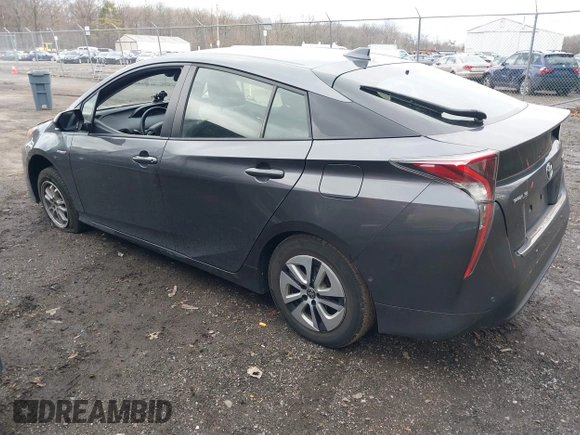 2018 Toyota Prius Two z VIN JTDKBRFU7J3065008, wystawiony jako IAAI lot #41744883 z przebiegiem 94 031 mil mil oraz . Historia ofert i sprzedaży dostępna na DreamBid. Obrazek 3.