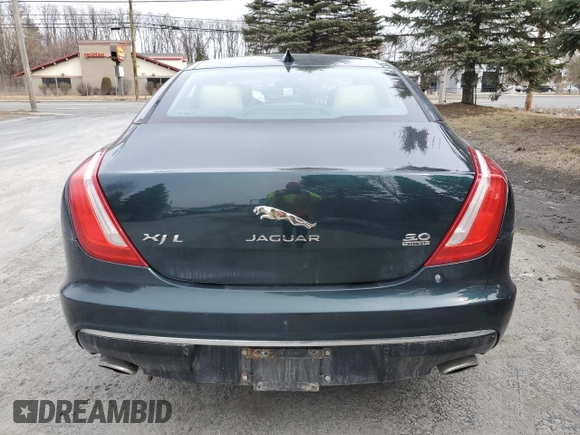 2016 Jaguar XJ Portfolio z VIN SAJWJ2GD0G8V92850, wystawiony jako Copart lot #47844065 z przebiegiem 99 652 mil mil oraz Szkoda całkowita • Salvage title. Historia ofert i sprzedaży dostępna na DreamBid. Obrazek 6.