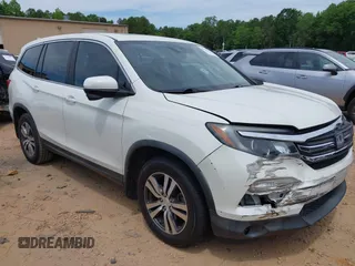 2017 Honda Pilot EX-L z VIN 5FNYF5H62HB010064, wystawiony jako IAAI lot #42330233 z przebiegiem 124 652 mil mil oraz . Historia ofert i sprzedaży dostępna na DreamBid. Obrazek 1.