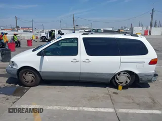 1998 Toyota Sienna LE with VIN 4T3ZF13C2WU066460, listed as a IAAI auction lot 42088006 with 169,014 mi miles and . Bid and sale history available at DreamBid. Image 14.