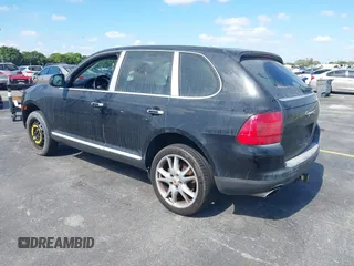 2004 Porsche Cayenne S with VIN WP1AB29P44LA75006, listed as a IAAI auction lot 41516951 with 119,828 mi miles. Bid and sale history available at carsss.com. Image 3.