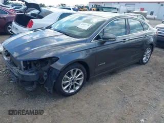 2017 Ford Fusion Hybrid SE z VIN 3FA6P0LU3HR260558, wystawiony jako IAAI lot #42657176 z przebiegiem 161 183 mil mil oraz . Historia ofert i sprzedaży dostępna na DreamBid. Obrazek 20.