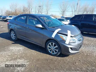 2014 Hyundai Accent GLS with VIN KMHCU4AE4EU669063, listed as a IAAI auction lot 41570386 with 72,786 mi miles and . Bid and sale history available at DreamBid. Image 1.