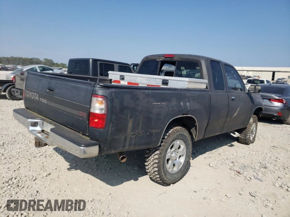 1997 Toyota T100 SR5 with VIN JT4UN24D8V0043620, listed as a Copart auction lot 86747534 with 185,470 mi miles and Salvage Title. Bid and sale history available at DreamBid. Image 3.