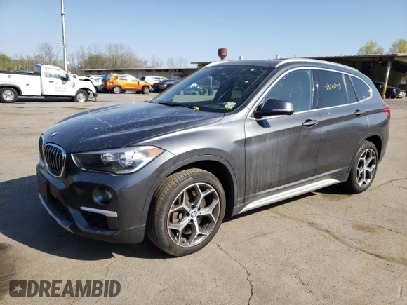 2018 BMW X1 xDrive28i with VIN WBXHT3C33J5K31838, listed as a Copart auction lot 48650943 with 63,064 mi miles and . Bid and sale history available at DreamBid. Image 1.