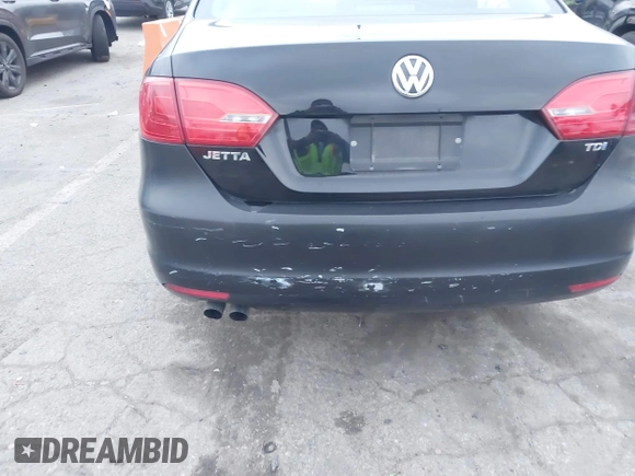 2013 Volkswagen Jetta TDI w/Premium/Nav with VIN 3VWLL7AJ4DM248448, listed as a IAAI auction lot 41749189 with 85,933 mi miles and . Bid and sale history available at DreamBid. Image 6.