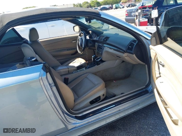 2011 BMW 1 Series 128i with VIN WBAUL7C52BVM80067, listed as a IAAI auction lot 41848583 with 94,825 mi miles. Bid and sale history available at carsss.com. Image 5.