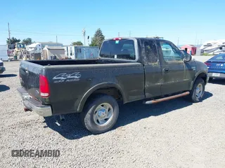 2000 Ford F-150 XL z VIN 1FTRX18L6YKB06492, wystawiony jako IAAI lot #42058110 z przebiegiem 169 217 mil mil oraz . Historia ofert i sprzedaży dostępna na DreamBid. Obrazek 4.