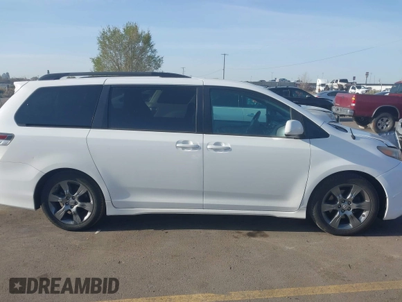 2012 Toyota Sienna SE with VIN 5TDXK3DC1CS221798, listed as a IAAI auction lot 41989210 with 198,962 mi miles. Bid and sale history available at carsss.com. Image 14.