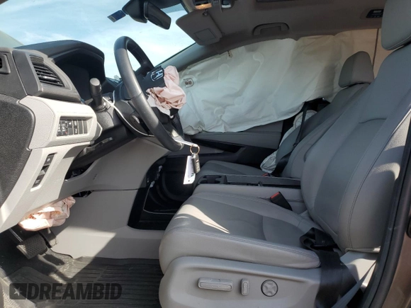 2024 Honda Odyssey EX-L with VIN 5FNRL6H6XRB016148, listed as a Copart auction lot 50639375 with 27,113 mi miles and Salvage Title. Bid and sale history available at DreamBid. Image 7.