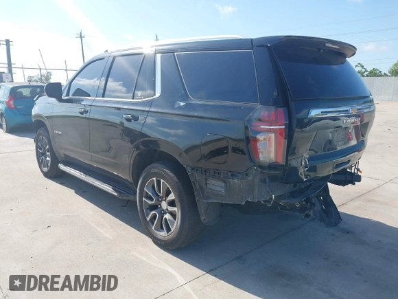 2023 Chevrolet Tahoe LT z VIN 1GNSCNKDXPR477061, wystawiony jako IAAI lot #42225743 z przebiegiem 57 077 mil mil oraz . Historia ofert i sprzedaży dostępna na DreamBid. Obrazek 3.