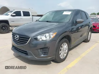 2016 Mazda CX-5 Sport with VIN JM3KE4BY8G0921243, listed as a IAAI auction lot 42102663 with 111,960 mi miles and . Bid and sale history available at DreamBid. Image 19.