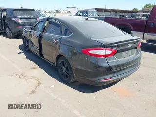 2016 Ford Fusion SE Hybrid z VIN 3FA6P0LU4GR260180, wystawiony jako IAAI lot #42508932 z przebiegiem 97 475 mil mil oraz . Historia ofert i sprzedaży dostępna na DreamBid. Obrazek 3.