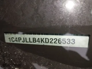2019 Jeep Cherokee Latitude Plus with VIN 1C4PJLLB4KD226533, listed as a IAAI auction lot 41512342 with 56,457 mi miles. Bid and sale history available at carsss.com. Image 9.