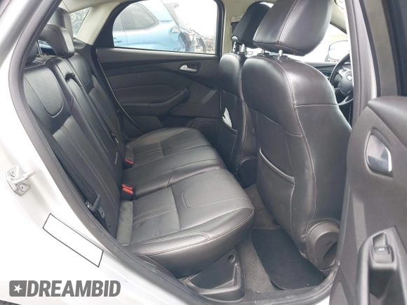 2014 Ford Focus SE with VIN 1FADP3F24EL323728, listed as a IAAI auction lot 41826974 with 141,357 mi miles and . Bid and sale history available at DreamBid. Image 8.