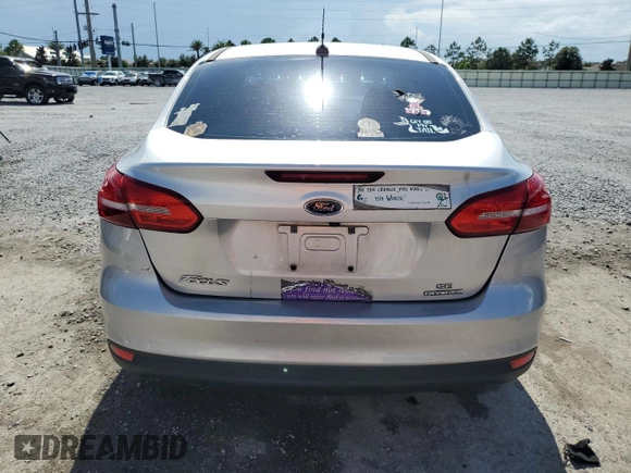 2016 Ford Focus SE z VIN 1FADP3F24GL309119, wystawiony jako Copart lot #62279095 z przebiegiem 117 535 mil mil oraz Szkoda całkowita • Salvage title. Historia ofert i sprzedaży dostępna na DreamBid. Obrazek 6.