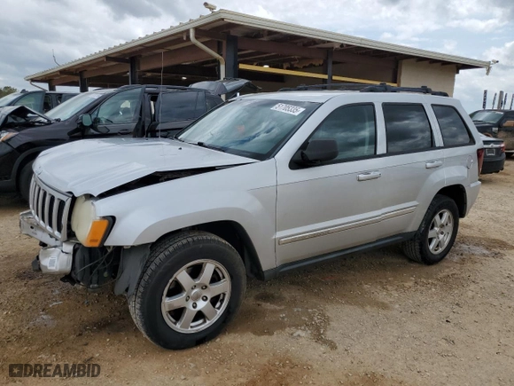 2010 Jeep Grand Cherokee Laredo with VIN 1J4PS4GK8AC146969, listed as a Copart auction lot 51705335 with 219,069 mi miles and Salvage Title. Bid and sale history available at carsss.com. Image 1.