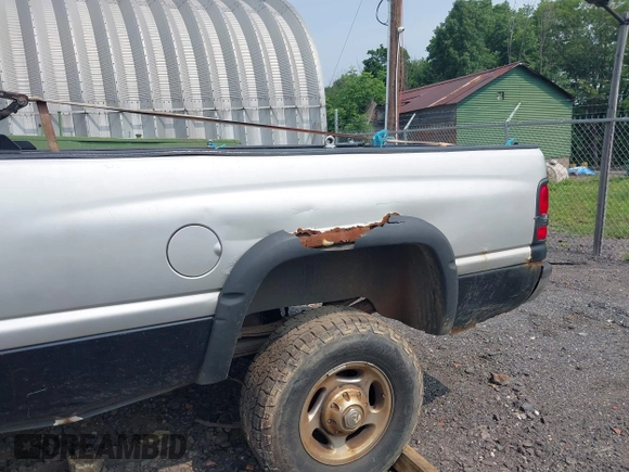 2001 Dodge 2500 z VIN 1B7KF23661J611536, wystawiony jako IAAI lot #42511635 z przebiegiem 304 447 mil mil oraz . Historia ofert i sprzedaży dostępna na DreamBid. Obrazek 13.