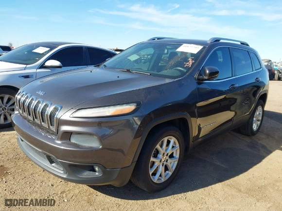 2014 Jeep Cherokee Latitude with VIN 1C4PJLCS3EW155236, listed as a IAAI auction lot 41877793 with 106,370 mi miles. Bid and sale history available at carsss.com. Image 2.