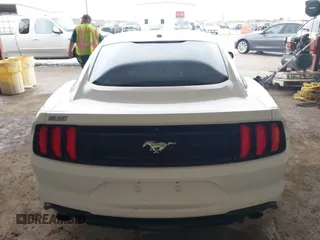 2019 Ford Mustang EcoBoost z VIN 1FA6P8TH1K5168795, wystawiony jako IAAI lot #42105634 z przebiegiem 61 480 mil mil oraz . Historia ofert i sprzedaży dostępna na DreamBid. Obrazek 16.