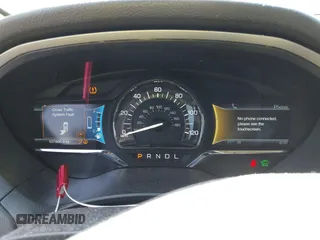 2014 Lincoln MKZ Hybrid with VIN 3LN6L2LU5ER815261, listed as a IAAI auction lot 42224030 with 107,866 mi miles and . Bid and sale history available at DreamBid. Image 16.