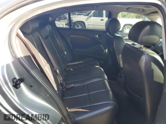 2005 Jaguar S-Type with VIN SAJWA01T15FN13800, listed as a Copart auction lot 53576305 with 182,533 mi miles and Salvage Title. Bid and sale history available at DreamBid. Image 10.