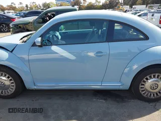 2013 Volkswagen Beetle with VIN 3VWHX7AT4DM667136, listed as a IAAI auction lot 41855778 with 120,300 mi miles and . Bid and sale history available at DreamBid. Image 15.