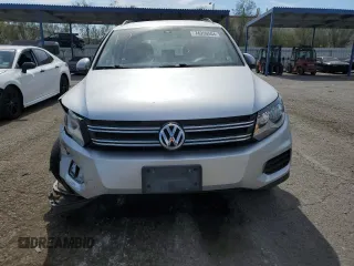 2017 Volkswagen Tiguan S with VIN WVGAV7AX1HK026998, listed as a Copart auction lot 74959504 with 93,696 mi miles and Salvage Title. Bid and sale history available at DreamBid. Image 5.