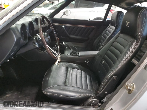 1977 Datsun 280ZX z VIN HLS30385475, wystawiony jako Copart lot #53284695 z przebiegiem 92 912 mil mil oraz Tytuł czysty. Historia ofert i sprzedaży dostępna na DreamBid. Obrazek 7.