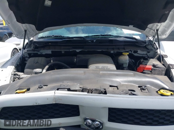2018 Ram 1500 Tradesman with VIN 1C6RR6FG8JS166266, listed as a IAAI auction lot 42128397 with 76,106 mi miles and . Bid and sale history available at DreamBid. Image 10.