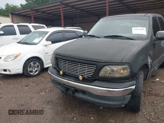 2001 Ford F-150 XLT with VIN 1FTRW07L41KB76786, listed as a IAAI auction lot 42522649 with Not provided miles and . Bid and sale history available at DreamBid. Image 6.
