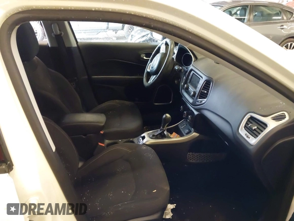 2018 Jeep Compass Sport with VIN 3C4NJCAB6JT124198, listed as a IAAI auction lot 41192196 with 104,557 mi miles. Bid and sale history available at carsss.com. Image 5.
