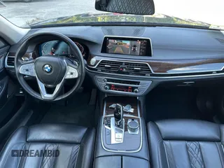 2022 BMW 7 Series 740i xDrive with VIN WBA7T4C06NCK78073, listed as a IAAI auction lot 42783922 with 104,432 mi miles and . Bid and sale history available at DreamBid. Image 6.