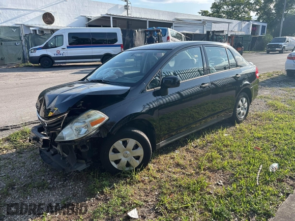 2010 Nissan Versa 1.6 with VIN 3N1CC1AP5AL391286, listed as a IAAI auction lot 42005172 with 33,441 mi miles. Bid and sale history available at carsss.com. Image 2.