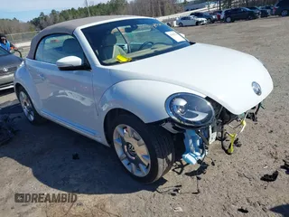 2018 Volkswagen Beetle S with VIN 3VW5DAAT1JM506988, listed as a IAAI auction lot 41589324 with 50,873 mi miles and . Bid and sale history available at DreamBid. Image 1.