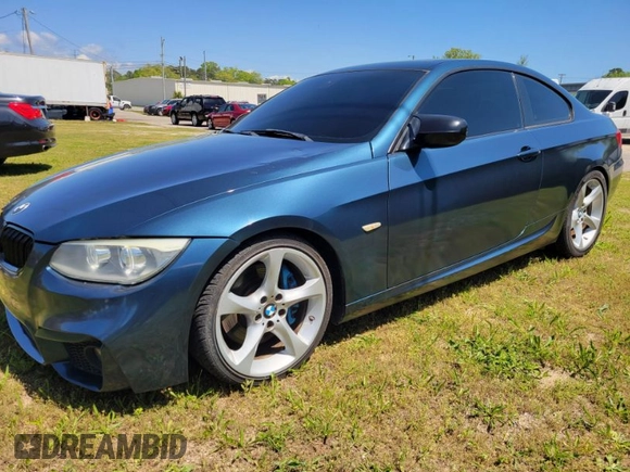 2012 BMW 3 Series 335i with VIN WBAKG7C51CE802713, listed as a IAAI auction lot 42032267 with 124,349 mi miles. Bid and sale history available at carsss.com. Image 1.