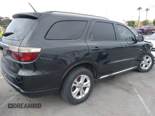 2012 Dodge Durango Crew with VIN 1C4SDHDT0CC321037, listed as a IAAI auction lot 42793232 with 162,593 mi miles and . Bid and sale history available at DreamBid. Image 4.