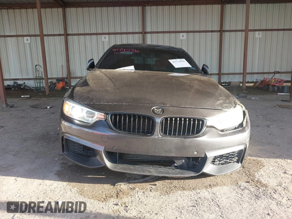 2015 BMW 4 Series 428i with VIN WBA4A5C54FG051307, listed as a IAAI auction lot 41774596 with 126,852 mi miles and . Bid and sale history available at carsss.com. Image 12.