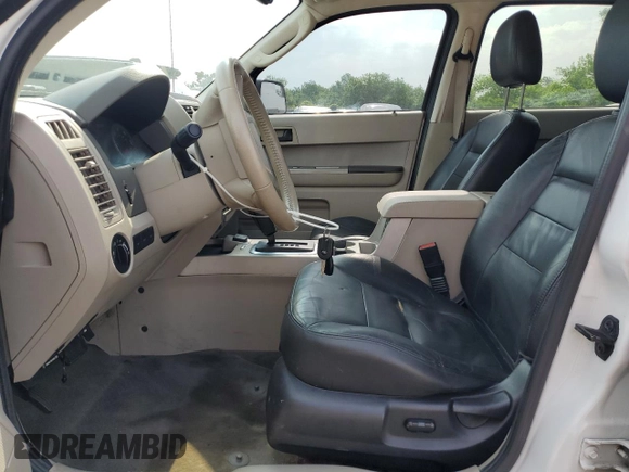 2011 Ford Escape Hybrid with VIN 1FMCU4K3XBKA56711, listed as a Copart auction lot 59789395 with 159,812 mi miles and Salvage title. Bid and sale history available at DreamBid. Image 7.