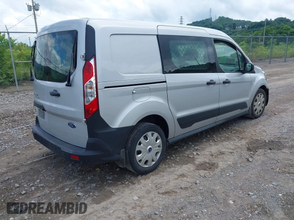 2021 Ford Transit Connect XL with VIN NM0LS7E24M1505630, listed as a IAAI auction lot 42525137 with 127,185 mi miles and . Bid and sale history available at DreamBid. Image 4.
