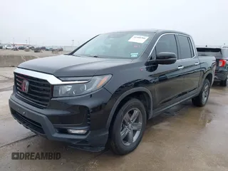 2022 Honda Ridgeline RTL-E with VIN 5FPYK3F75NB020036, listed as a IAAI auction lot 41500206 with 79,655 mi miles and . Bid and sale history available at DreamBid. Image 2.