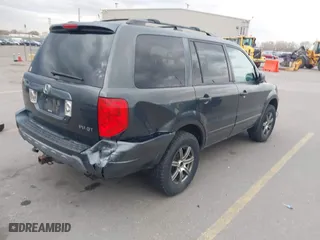 2004 Honda Pilot EX with VIN 2HKYF18644H516791, listed as a IAAI auction lot 41876348 with 291,358 mi miles. Bid and sale history available at carsss.com. Image 4.