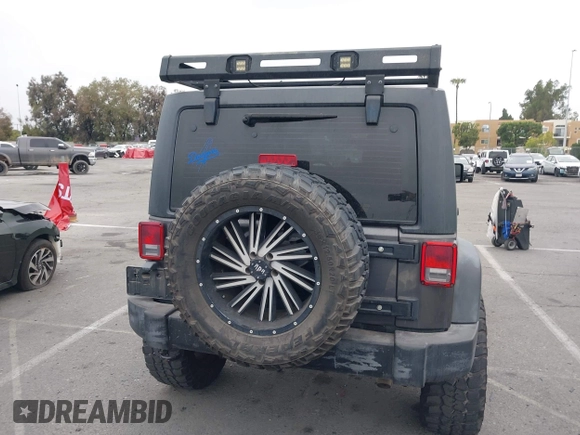 2016 Jeep Wrangler Unlimited Sport с VIN 1C4BJWDG7GL215562, выставлен на аукционе IAAI как лот 42425994 с пробегом 81 895 миль миль и . История ставок и продаж доступна на DreamBid. Изображение 17.