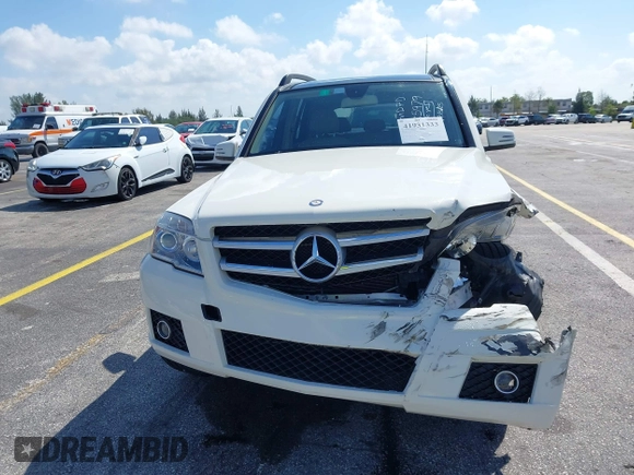 2012 Mercedes-Benz GLK GLK 350 with VIN WDCGG5GB8CF735979, listed as a IAAI auction lot 41931333 with 124,649 mi miles. Bid and sale history available at carsss.com. Image 12.