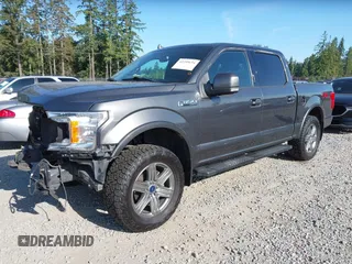 2018 Ford F-150 XL with VIN 1FTEW1E55JFC57989, listed as a IAAI auction lot 42395654 with 55,505 mi miles and . Bid and sale history available at DreamBid. Image 19.