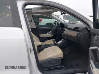 2020 Audi Q3 S line Premium Plus with VIN WA1EECF37L1078293, listed as a IAAI auction lot 42158322 with 56,345 mi miles and . Bid and sale history available at DreamBid. Image 5.
