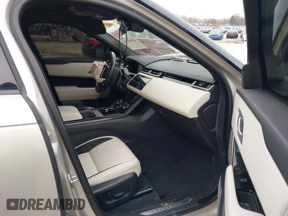 2019 Land Rover Range Rover Velar R-Dynamic SE with VIN SALYL2EV7KA795130, listed as a IAAI auction lot 40948729 with 66,353 mi miles and . Bid and sale history available at DreamBid. Image 5.
