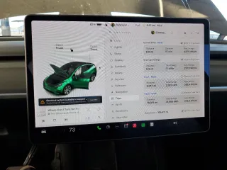 2021 Tesla Model Y Long Range with VIN 5YJYGDEEXMF151557, listed as a Copart auction lot 54936885 with 106,411 mi miles and Salvage Title. Bid and sale history available at DreamBid. Image 9.
